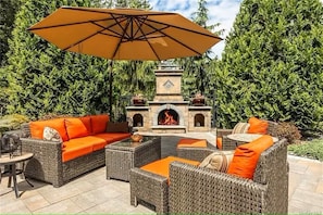 Enjoy cool nights around the outdoor fireplace