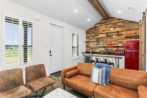 Relax and recharge in the heart of the ranch—cozy, bright, and full of charm