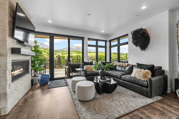 Luxury Silverthorne mountain penthouse with breathtaking views, designer interiors, private decks, private hot tub, outdoor heater, and minutes to skiing, hiking, Blue River dining and Lake Dillon adventures. 
