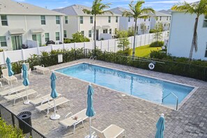 Resort-style pool just steps from youor door for easy relaxing