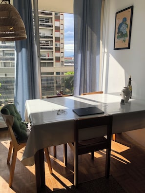 Dining table with a view on gardens and canal