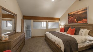 king bedroom in loft that can be closed