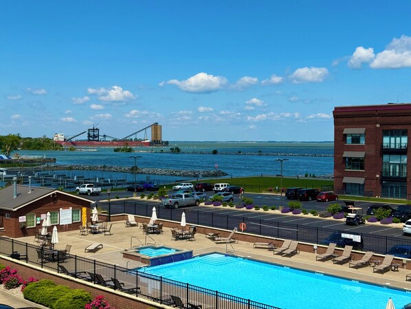 Pool View Overlook
A panoramic view of the pool, marina, and large lake freighter passing by—offering an authentic waterfront experience.