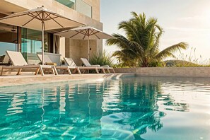 Spectacular heated pool with ocean views and luxurious outdoor furniture