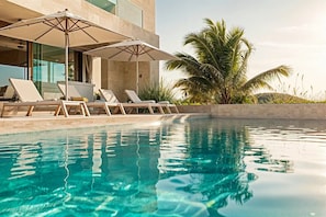 Spectacular heated pool with ocean views and luxurious outdoor furniture
