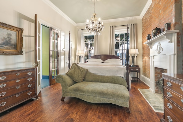 Armstrong's elegant king bedroom with soaring ceilings and inviting decor