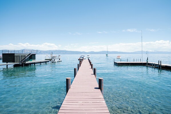 Enjoy access to a private pier and sandy beach—perfect for lakeside relaxation