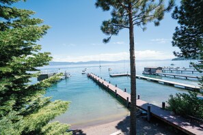 Enjoy access to a private pier and sandy beach—perfect for lakeside relaxation