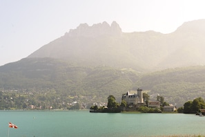 Breathtaking view of Château de Duingt, jewel of Lake Annecy
