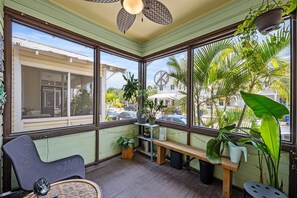 Enjoy a slow morning coffee out on the breezy front porch