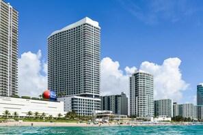 Stay in a towering building with expansive views, offering both luxury and comfort high above the surroundings.