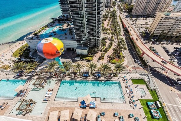 Relax and unwind in the refreshing outdoor pool, perfect for enjoying the sun and cooling off.