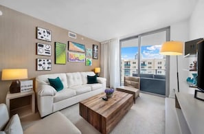 Relax in the inviting, cozy living room, designed for comfort and warmth. Whether you’re lounging after a day of exploring or enjoying a quiet evening, this space offers the perfect setting to unwind.