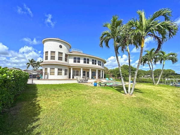 Front Yard View from the waterfront seawall back towards the home.