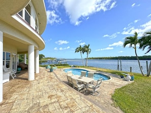 Pool & Deck View in the Front Yard overlooking the pristine waterfront.