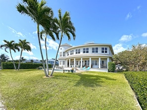 Front Yard View from the waterfront seawall back towards the home.