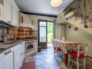 Furniture, Interior Design, Flooring, Wood, Floor, Kitchen, Home, Ceiling, Room, Lighting