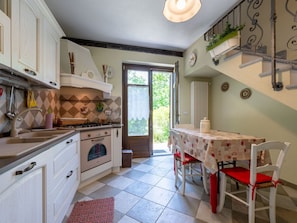 Furniture, Interior Design, Flooring, Wood, Floor, Kitchen, Home, Ceiling, Room, Lighting