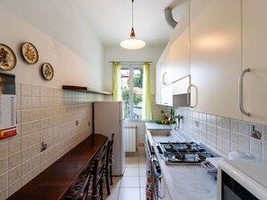 Kitchen, Countertop, Flooring, Kitchen Appliance, Interior Design, Major Appliance, Kitchen Sink, Room, Apartment, Ceiling