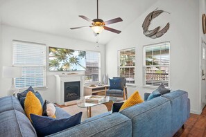 Curl up in the breezy living room & stream your favorites on the smart TV