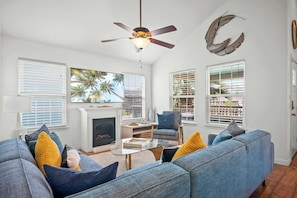 Curl up in the breezy living room & stream your favorites on the smart TV