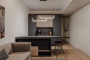 Compact modern kitchen and cozy dining booth