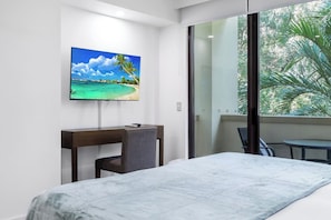 Whether you’re streaming a movie or catching up on work, this peaceful nook with a smart TV and desk offers the perfect blend of leisure and focus.