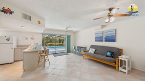 Ground floor wet bar with pool view.
