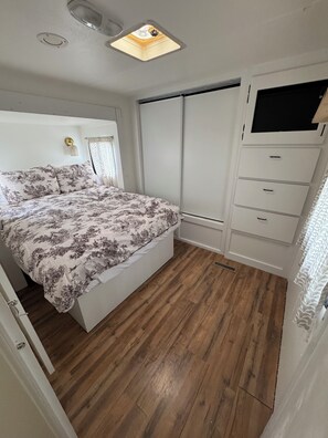 queen size bed, luxury linens and down pillows