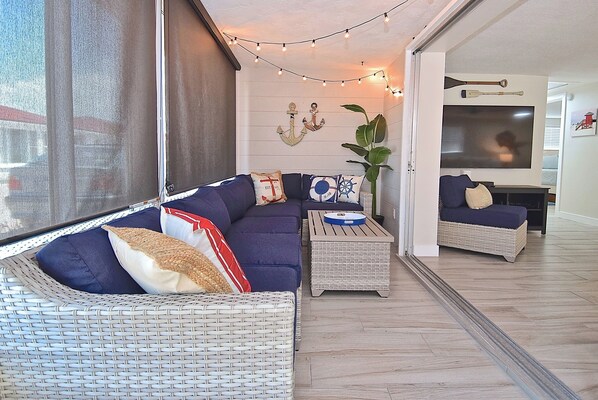 All season sun-room provides extra space for napping or reading 