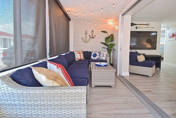 All season sun-room provides extra space for napping or reading