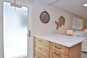 A peninsula with 2 barstools 