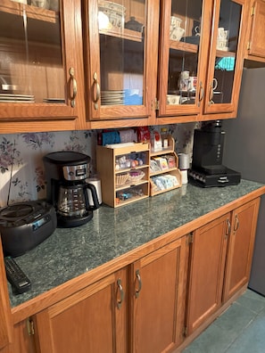 Full coffee bar with coffee, decaf coffee, tea, decaf tea, and hot chocolate.