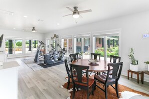 Dining area and work out equipment.