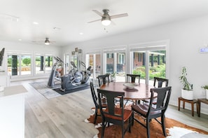 Dining area and work out equipment.