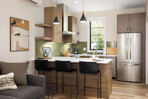 This inviting kitchen blends functionality and style—perfect for preparing meals during your stay.