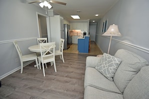 View of Dining, Kitchen, & Entry from Living Area