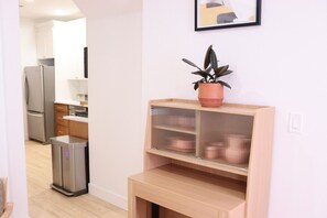 Retractable Dining Table when not in use & Fully equipped modern kitchen