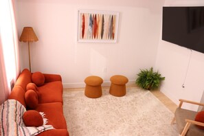 Stylish and comfortable design-forward livingroom with Smart TV