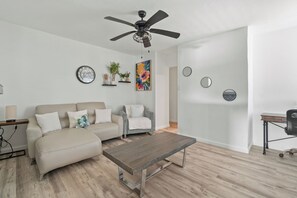 Inviting living area with stylish decor and comfortable seating.

