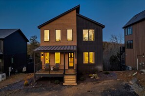 Modern design meets nature; enjoy stunning views from the inviting porch!