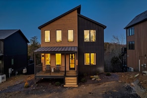 Modern design meets nature; enjoy stunning views from the inviting porch!