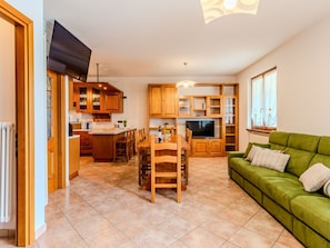 Furniture, Interior Design, Wood, Flooring, Ceiling, Floor, Room, Couch, Living Room, Cabinetry