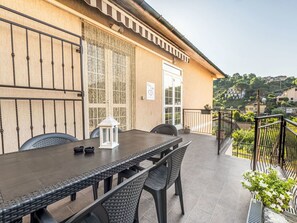 Furniture, Balcony, Apartment, Outdoor Furniture, Chair, Shade, Fence, Outdoor Table, Deck, Porch