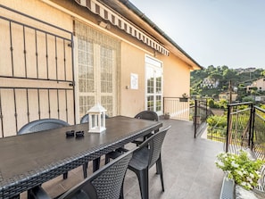 Furniture, Balcony, Apartment, Outdoor Furniture, Chair, Shade, Fence, Outdoor Table, Deck, Porch