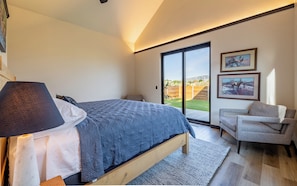 Primary bedroom suite with King bed envelops you in tranquility.