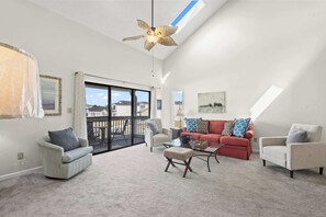 Sofa and two cozy chairs for plenty of seating.