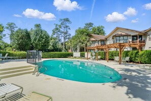 Community Pool at Harbour Oaks - Soak up the sun—or cool off after a morning run to Palm Coast Coffee—at the Harbour Oaks community pool, surrounded by lounge chairs, pergolas, and enough lush island landscaping to make you forget you’re just minutes from the Pier Village action.