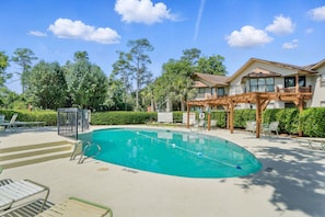 Community Pool at Harbour Oaks - Soak up the sun—or cool off after a morning run to Palm Coast Coffee—at the Harbour Oaks community pool, surrounded by lounge chairs, pergolas, and enough lush island landscaping to make you forget you’re just minutes from the Pier Village action.