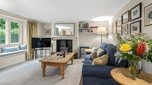 Gather around the fire for long conversations in the living room and make time for board games together